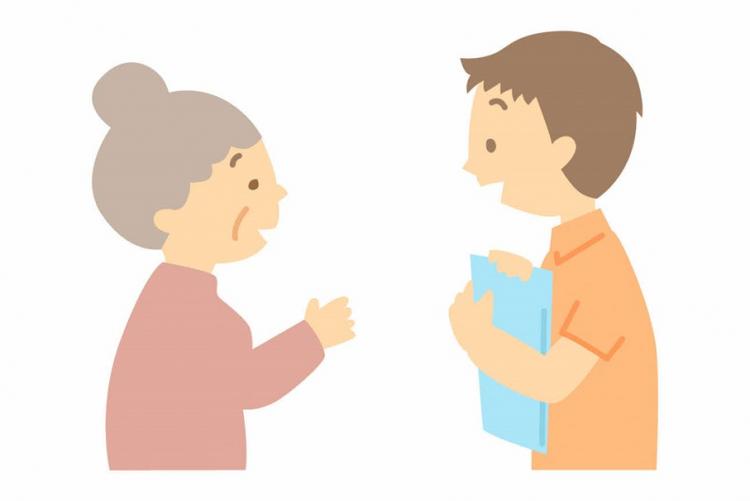 高齢者と会話しているイラスト